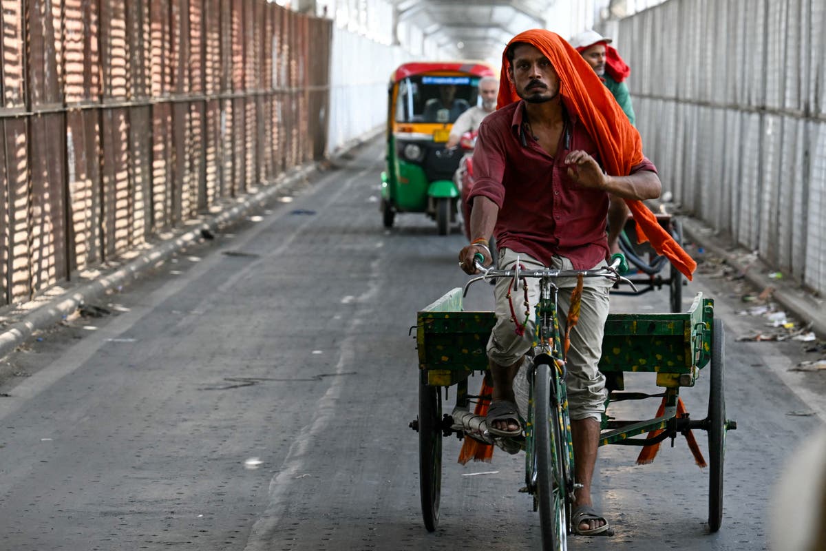 Delhi records hottest night ever as relentless heatwave claims five lives | The Independent