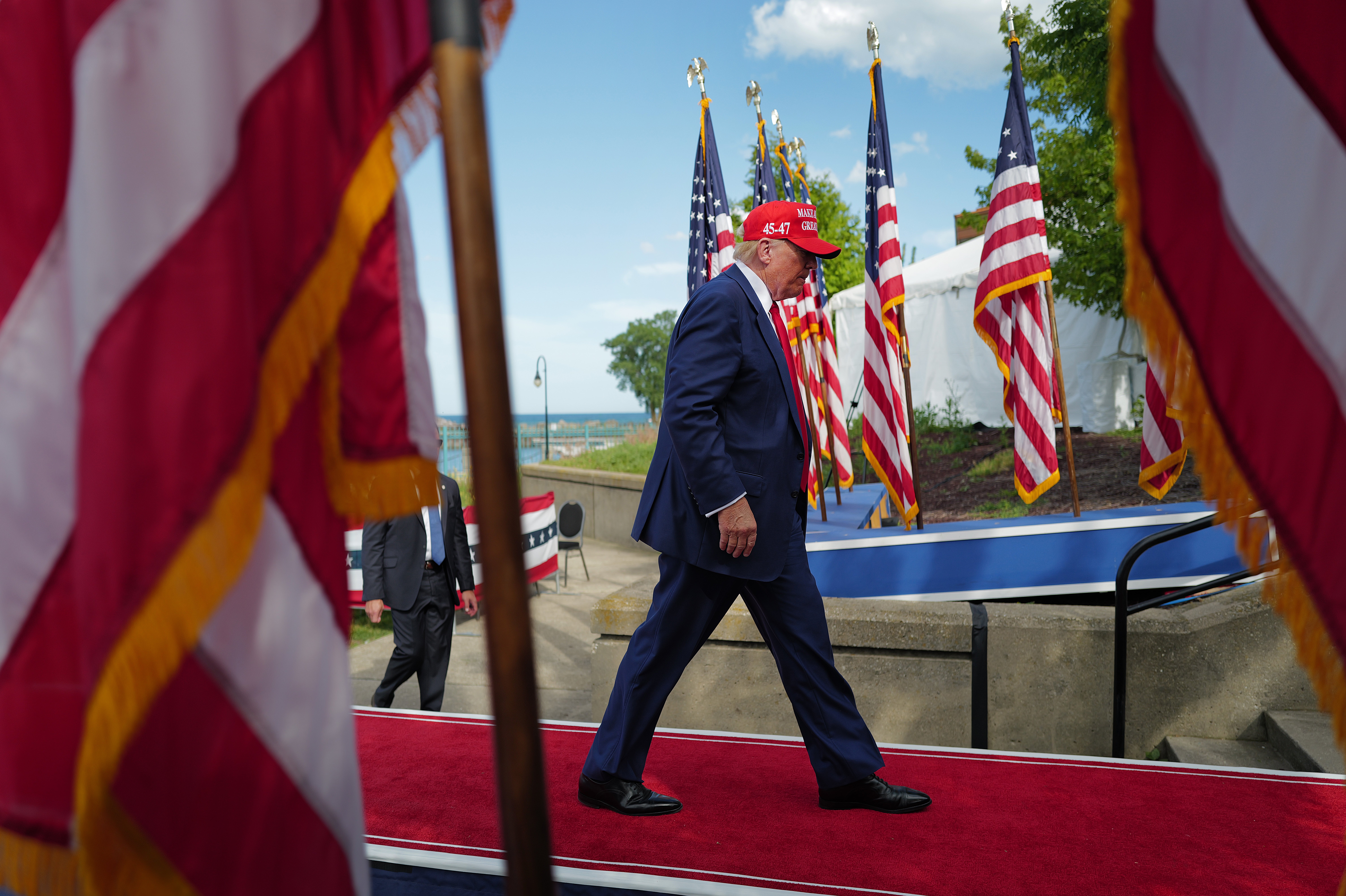 Republican presidential candidate former President Donald Trump leaves a rally at Festival Park on June 18, 2024 in Racine, Wisconsin. During the event he said he “loves” Milwaukee after previousl bashing the city.