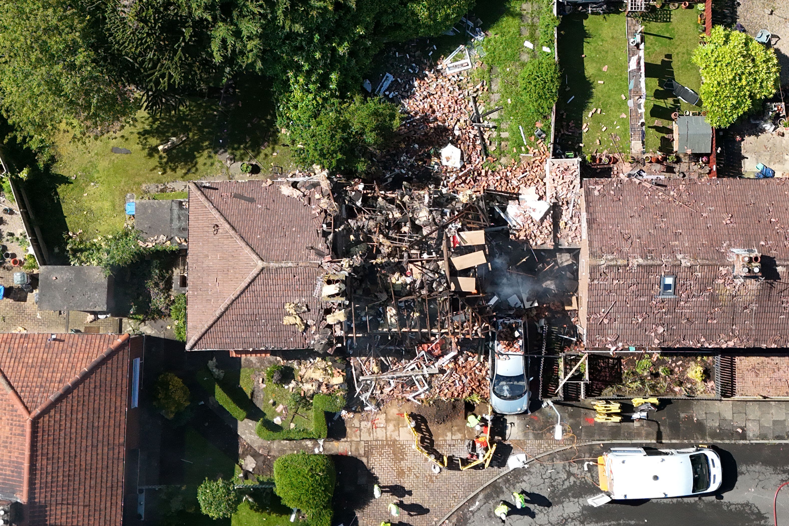 A suspected gas explosion wrecked one home and badly damaged others in Kirkland Walk, Middlesbrough, on Tuesday (Owen Humphreys/PA)