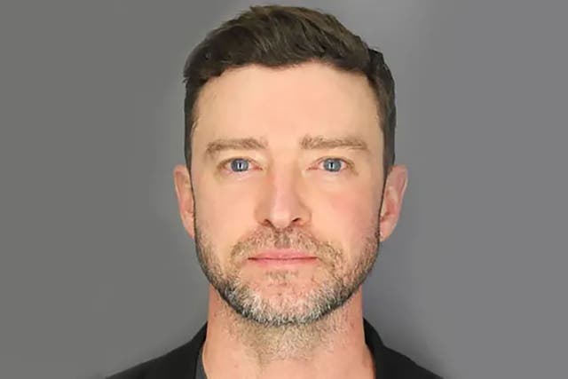 <p>Pale and mortified: Timberlake’s mugshot following his arrest</p>