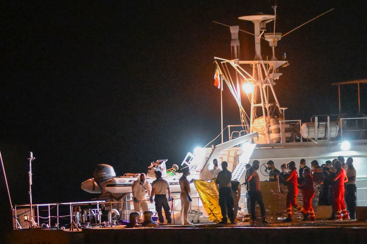 Italian coast guard searches for dozens of migrants missing after their ship capsized