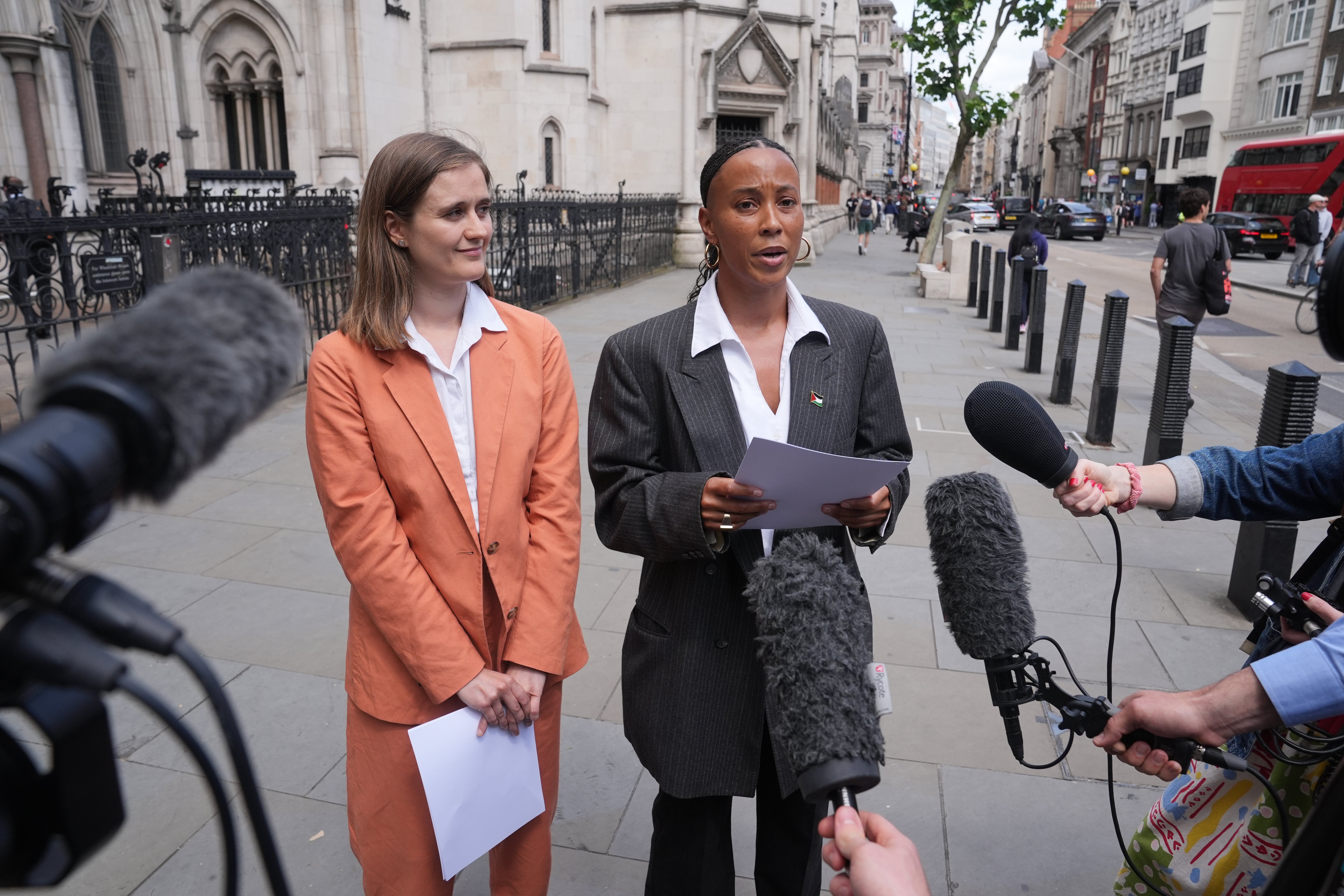 Ella Janneh and her lawyer Catriona Rubens from Leigh day outside of the Royal Courts of Justice