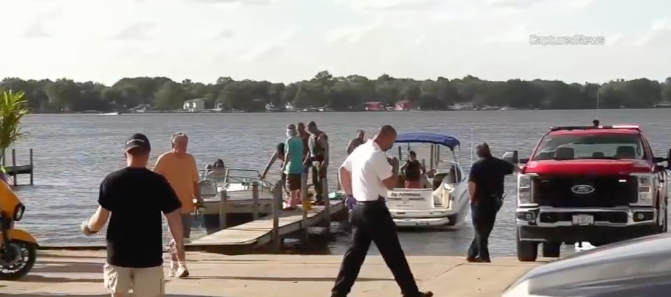 Police respond to the scene of a boat crash on Lake Marie in Illinois, where two girls on a jet ski died after colliding with a boat on June 28, 2024