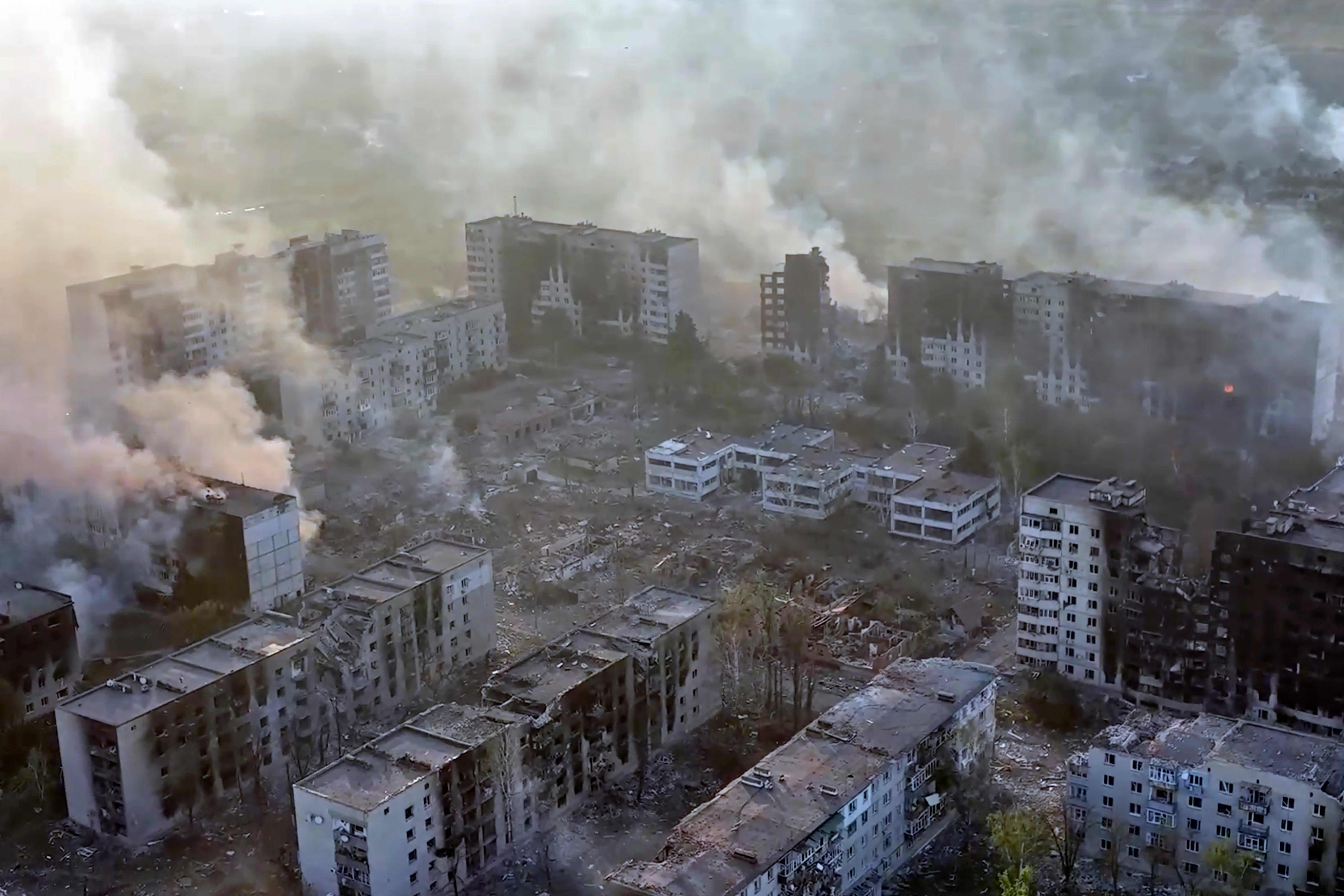 This image taken from a video released by the Ukrainian Tsunami Assault Regiment, Liut Brigade, shows the northeastern frontline town of Vovchansk, Ukraine, during heavy bombardment by Russian forces May 28, 2024