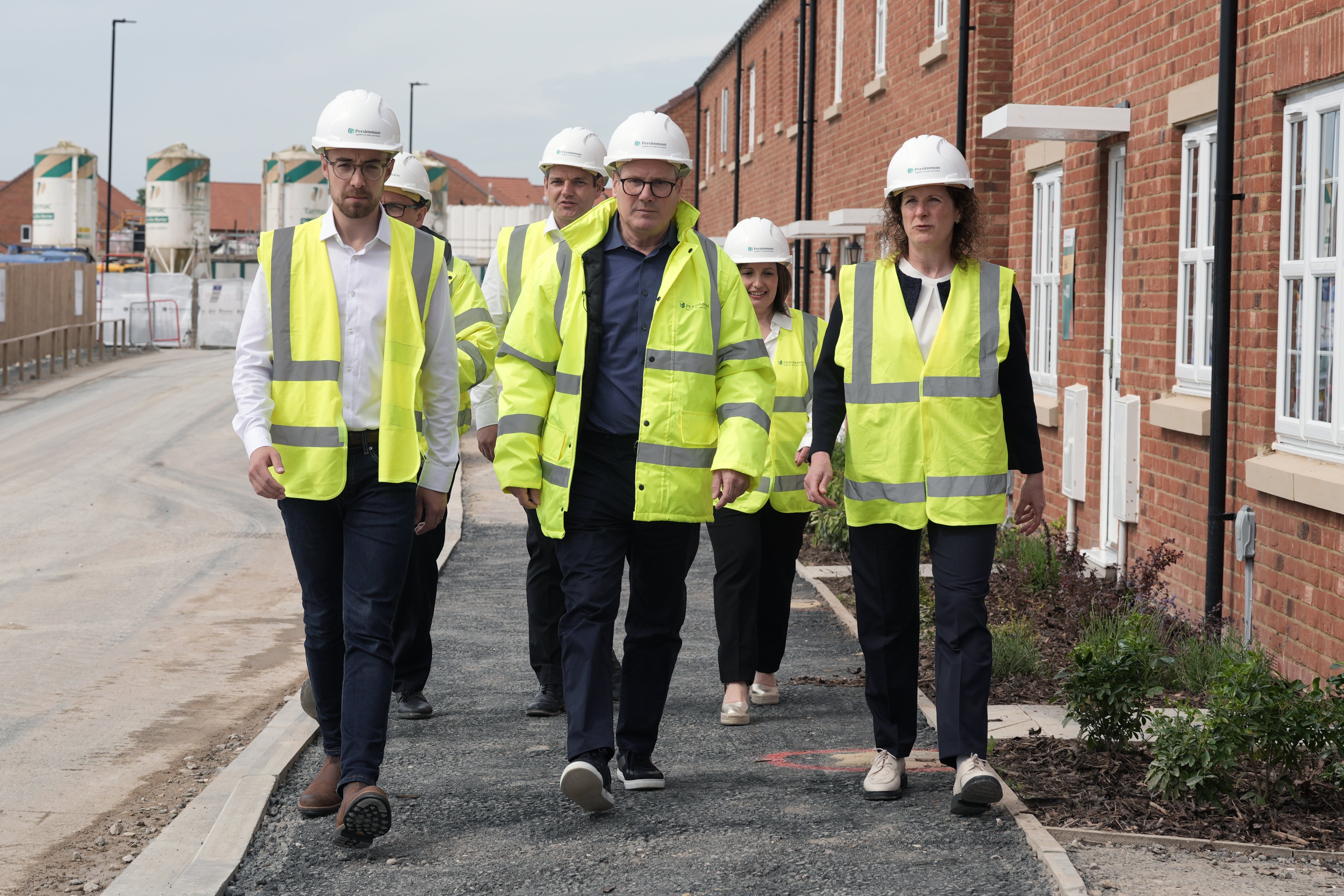 Labour leader Sir Keir Starmer (centre) during a visit to Persimmon Homes Germany Beck in York, while on the General Election campaign trail