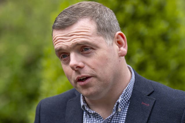 Douglas Ross was questioned about the issue at Holyrood (Jane Barlow/PA)