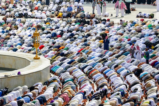 <p>Muslim pilgrims pray around the Kaaba, Islam’s holiest shrine, at the Grand Mosque in the holy city of Mecca</p>