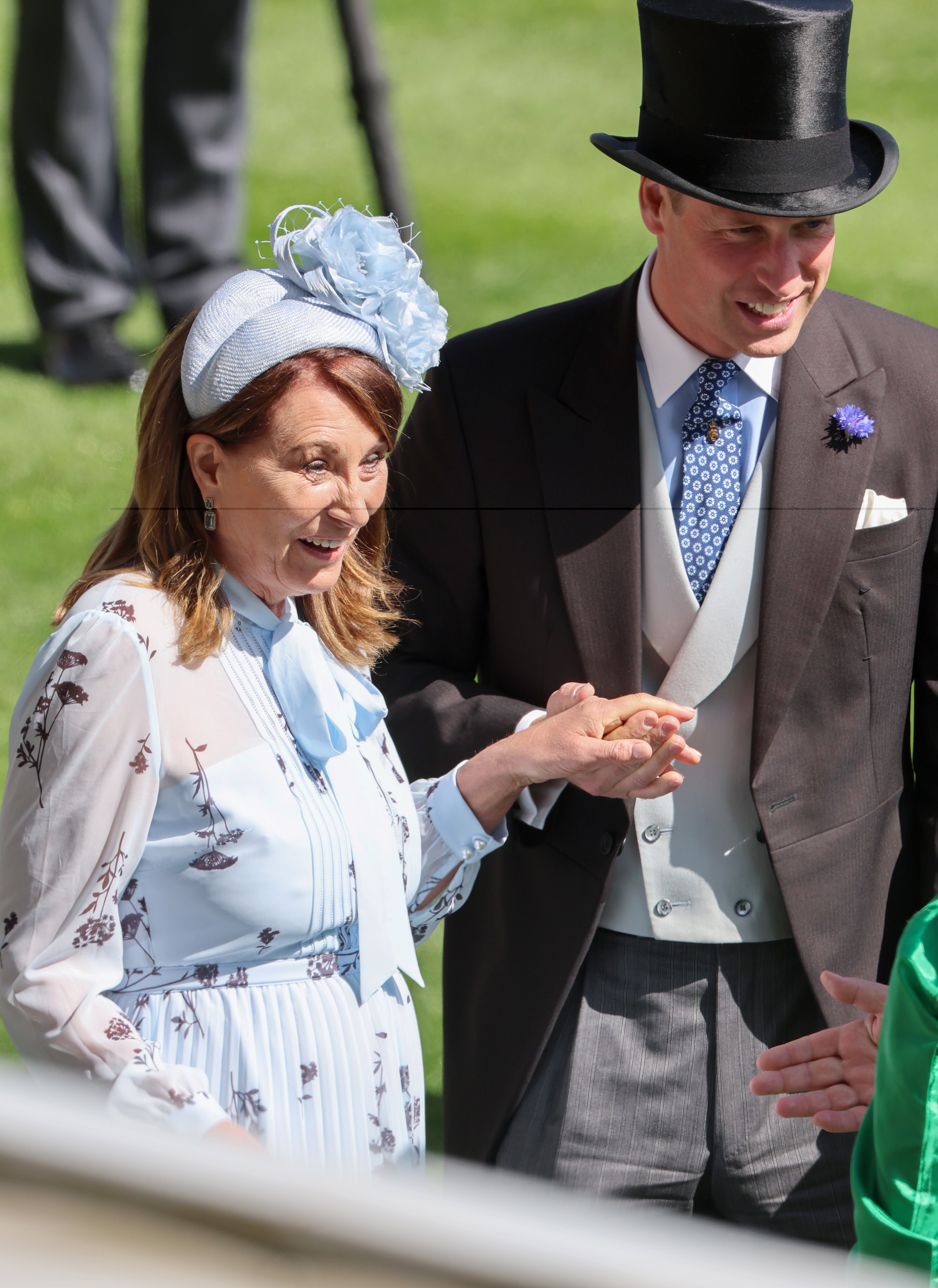 Carole was seen holding William’s hand at one point during Royal Ascot.