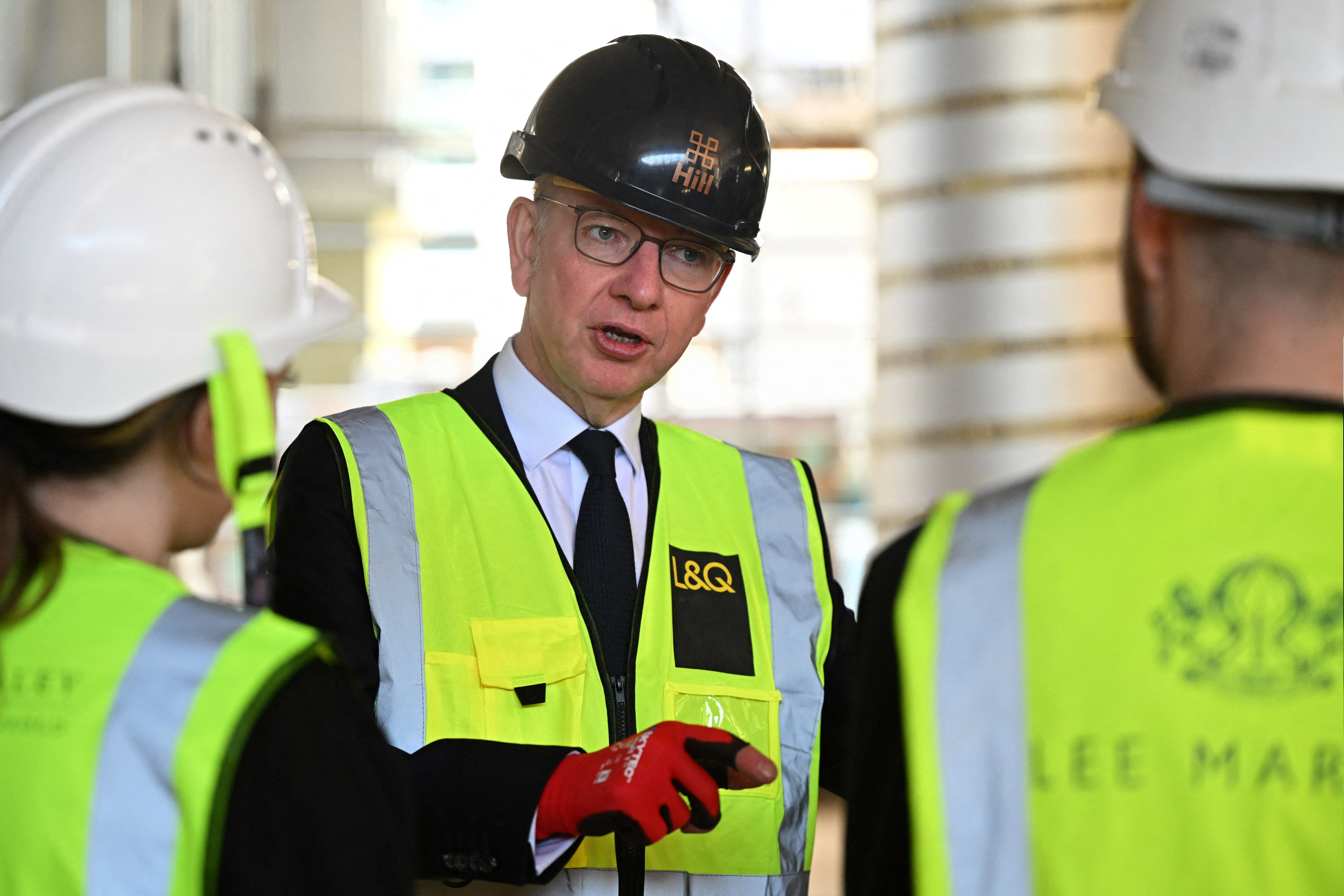 Journalists sat around a conference table in a plain white room while Gove toured the site