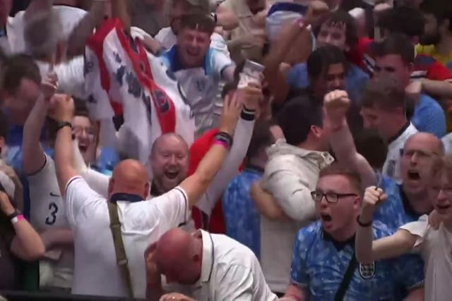 <p>England fans celebrate Harry Kane’s opening goal against Denmark in Euro 2024 match.</p>