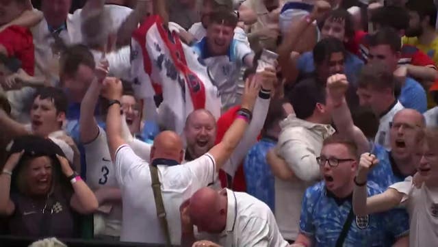 <p>England fans celebrate Harry Kane’s opening goal against Denmark in Euro 2024 match.</p>