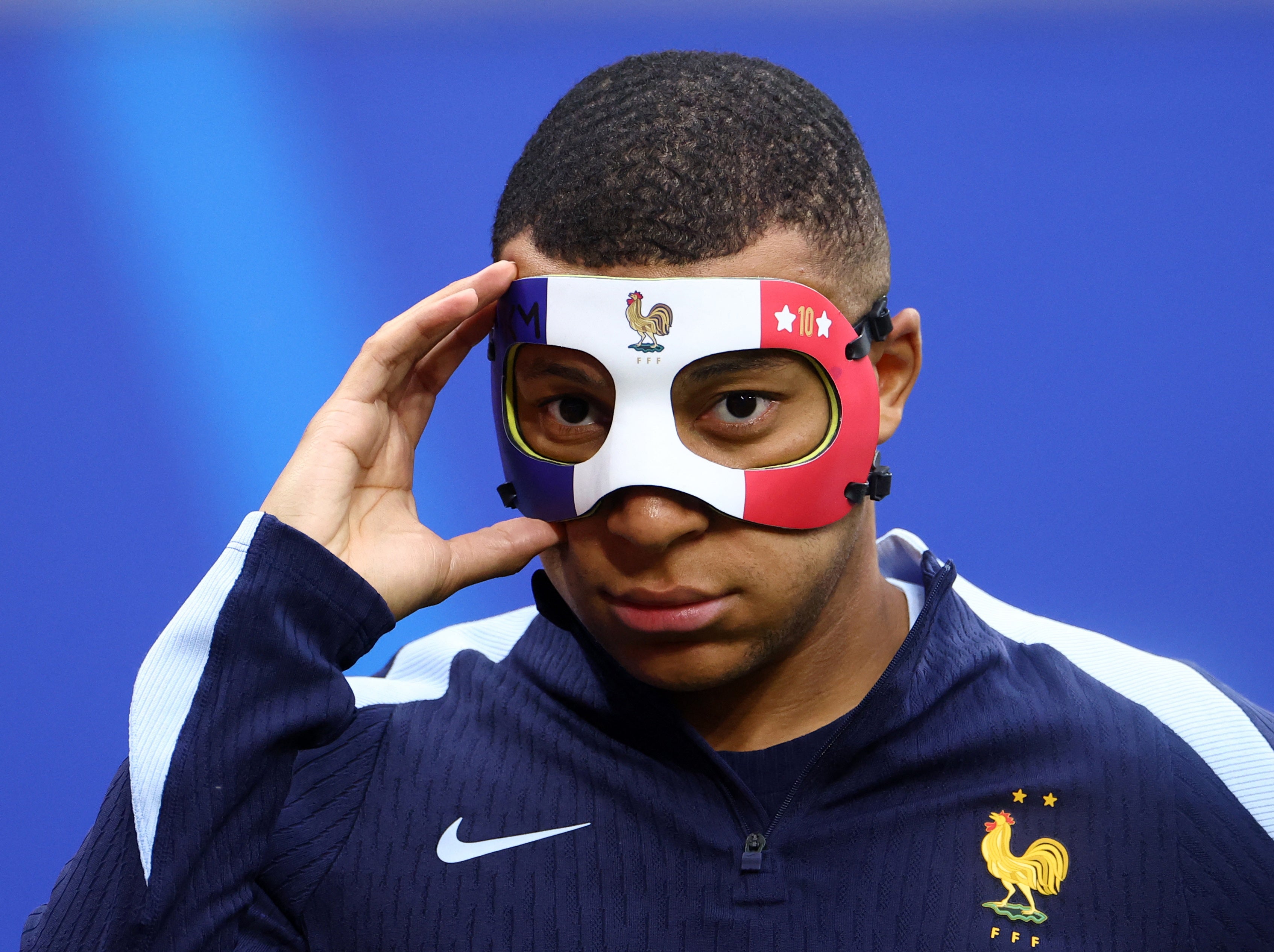 Kylian Mbappe sports his new face mask