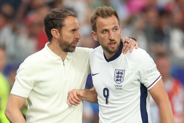 <p>Gareth Southgate consoles Harry Kane after bringing him off</p>