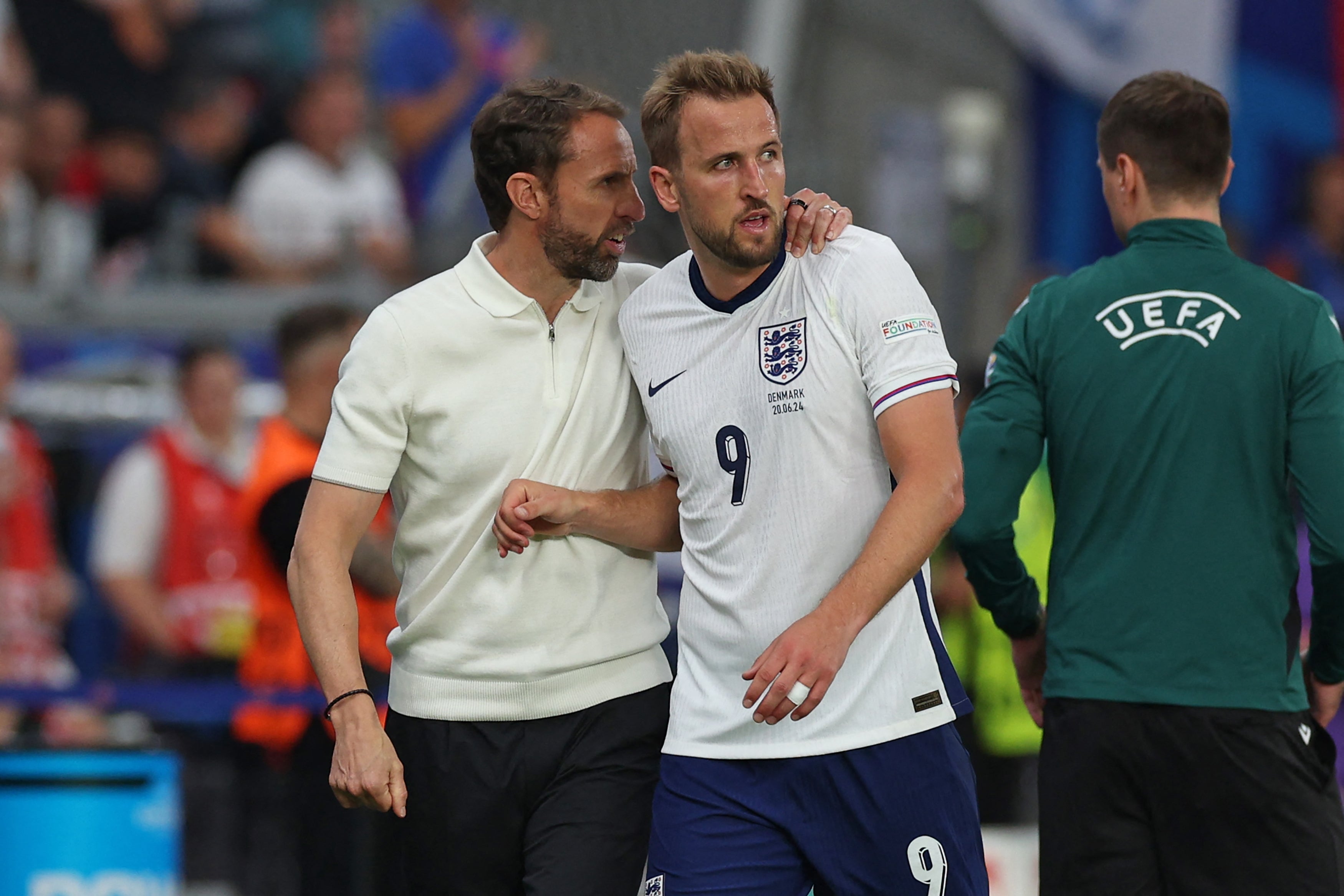 The England manager consoles captain Harry Kane