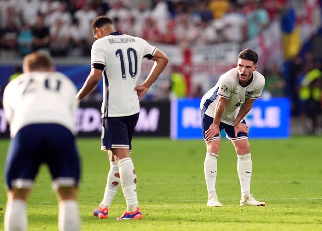 <p>England players react to the final whistle in Frankfurt</p>