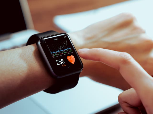 <p>Close up of hand touching smartwatch with health app on the screen (<em>Getty Images</em>)</p>