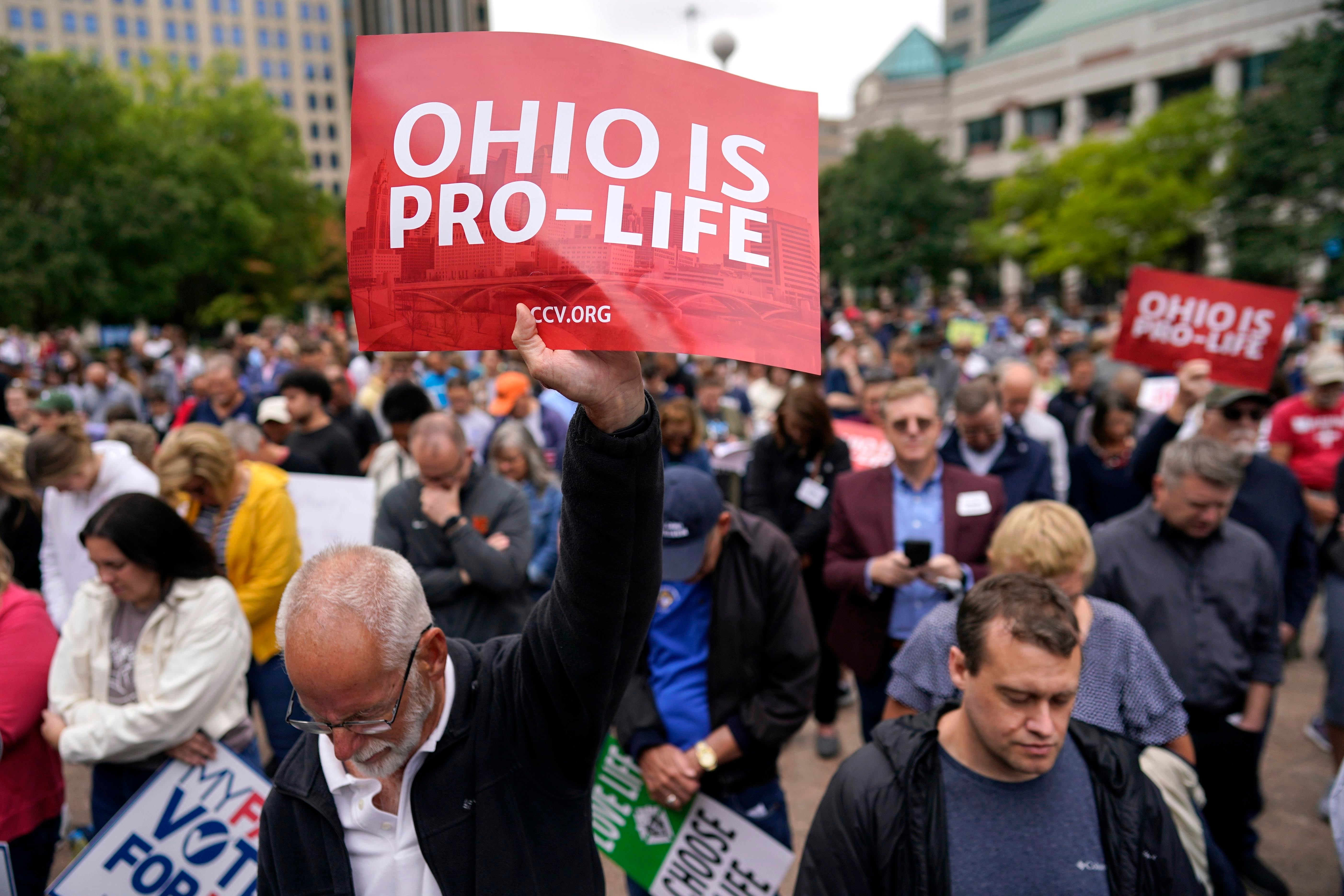 Anti-abortion demonstrators march in the Ohio March for Life
