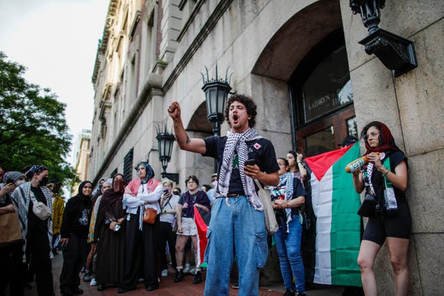 <p>A pro-Palestinian protestor shouts slogans during a protest outside Columbia University, in New York City on 23 May  2024</p>