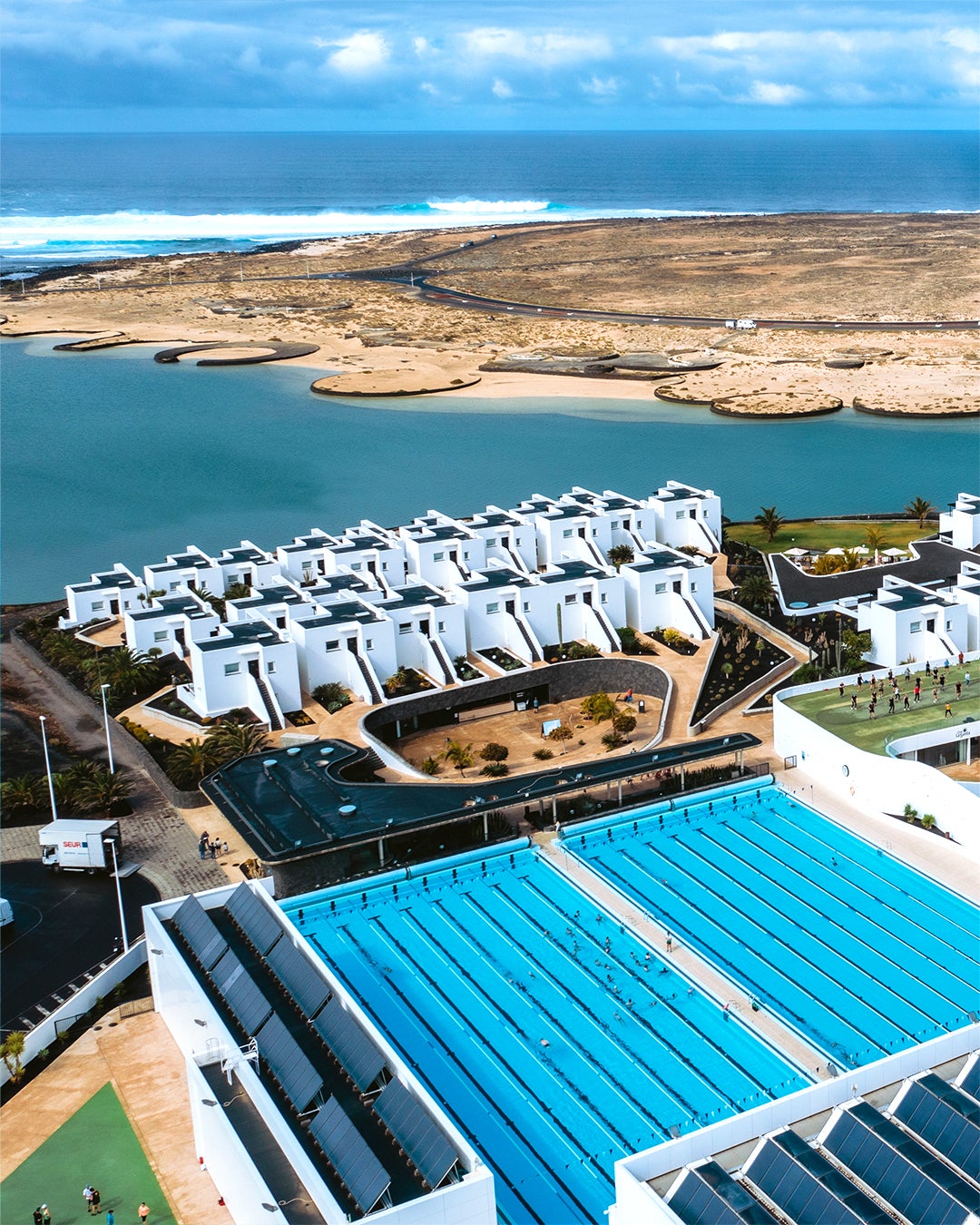 Beyond the pool complex is the lagoon, for open-water swimming, stand-up paddleboarding and windsurfing