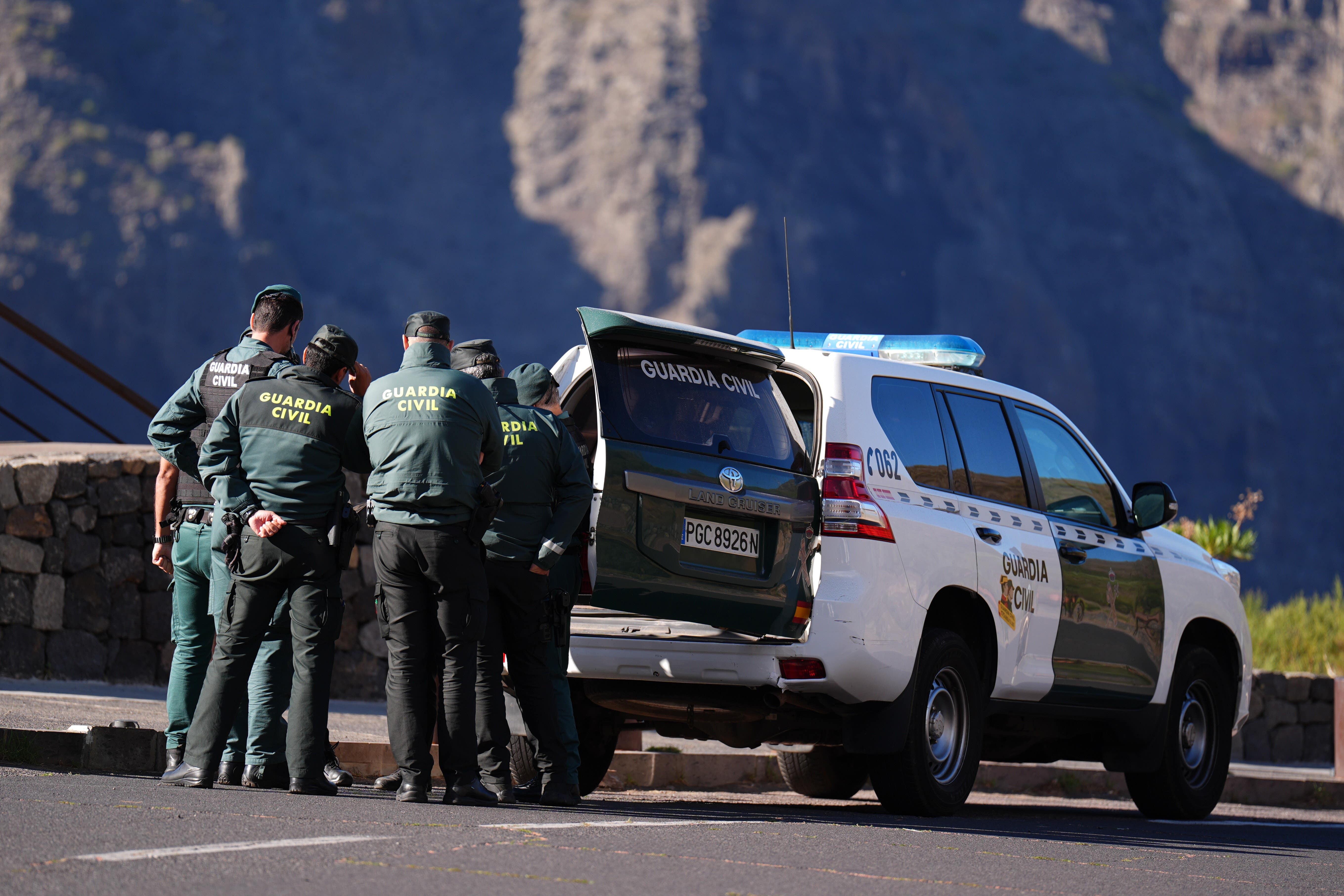 Guardia Civil officers near the village of Masca, Tenerife (James Manning/PA)