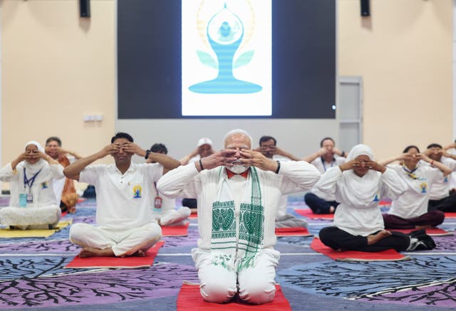 <p>Indian prime minister Narendra Modi marks International Day of Yoga on banks of Dal Lake in Srinagar</p>