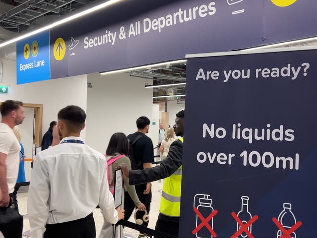 <p>Check point: Entrance to the security area at Birmingham airport</p>