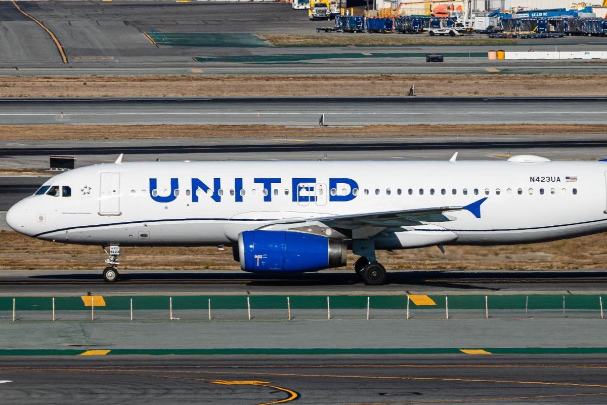 Panic on United Airlines flight after flames shoot out of wings on take-off