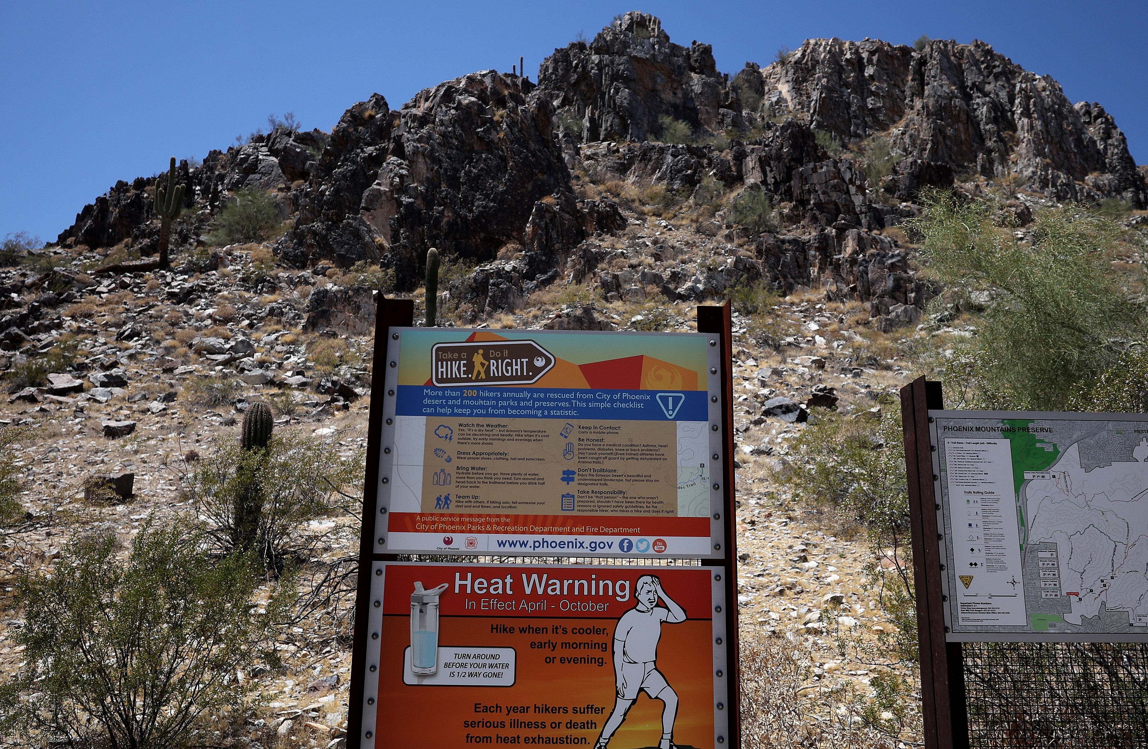 A sign in Arizona warns outdoor hikers about extreme heat. Arizona, which saw its first heat wave of the year in June, is home to the nation’s first-ever Chief Heat Officer