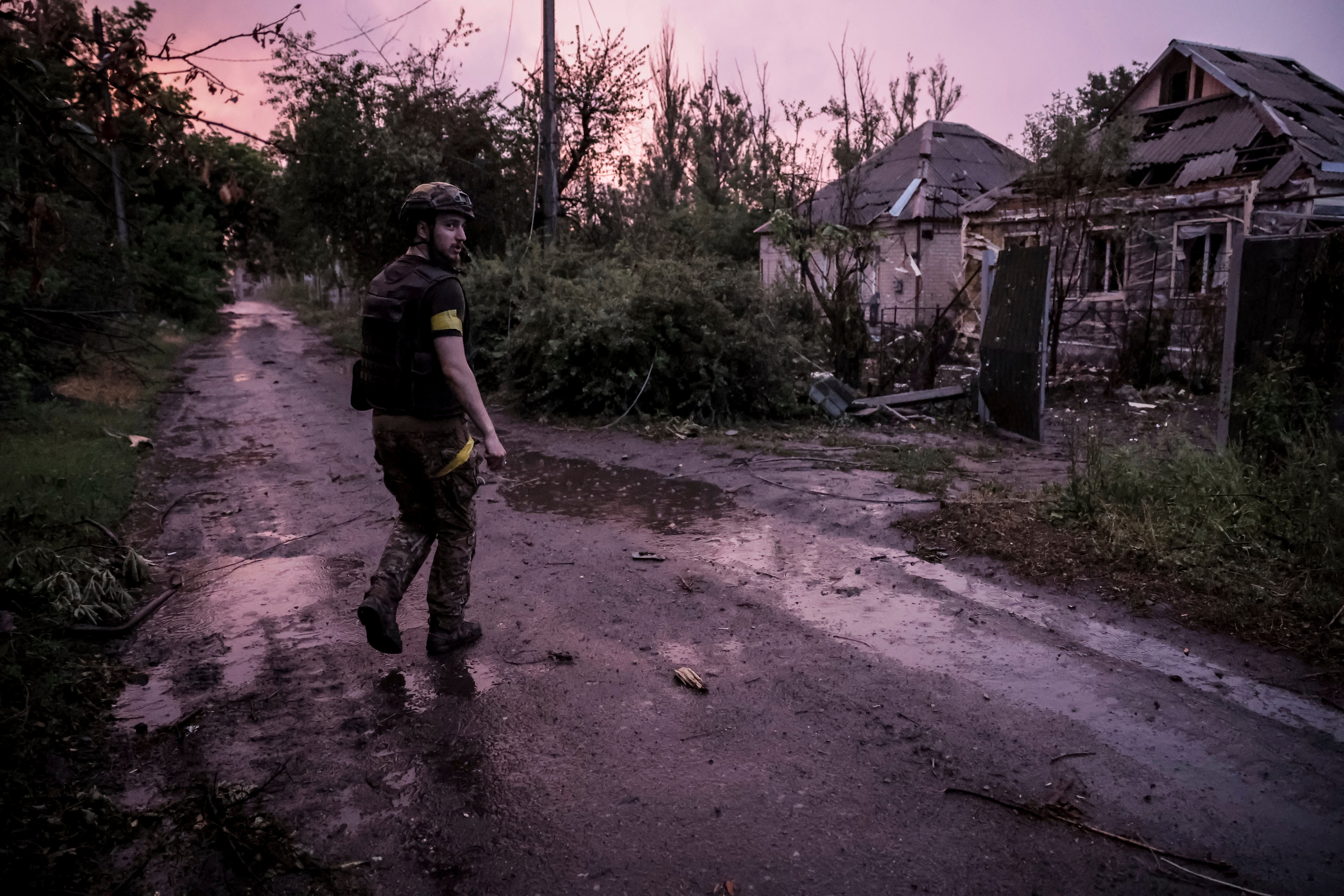 A Ukrainian soldier approaches his position