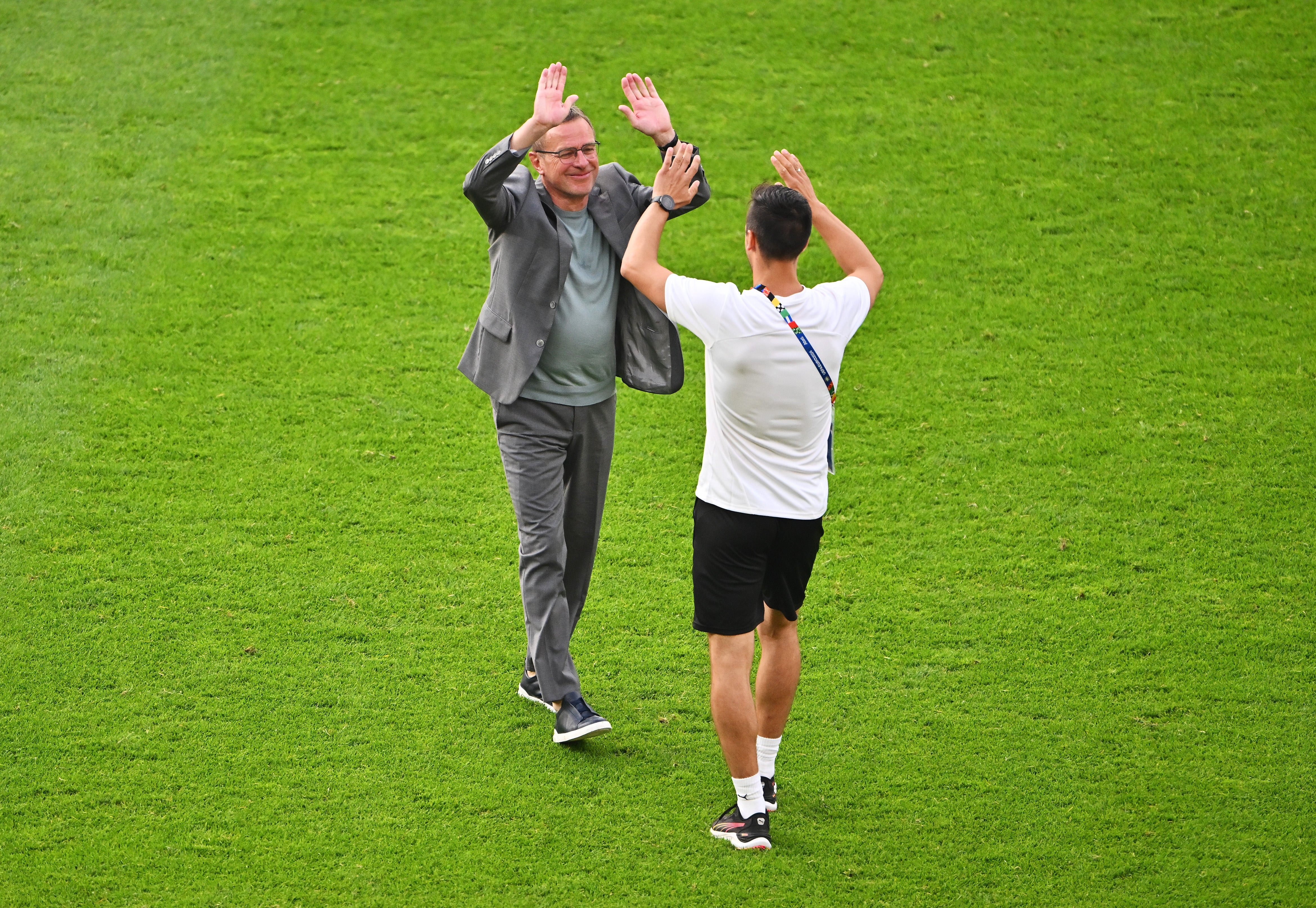 Rangnick, left, is congratulated after the win