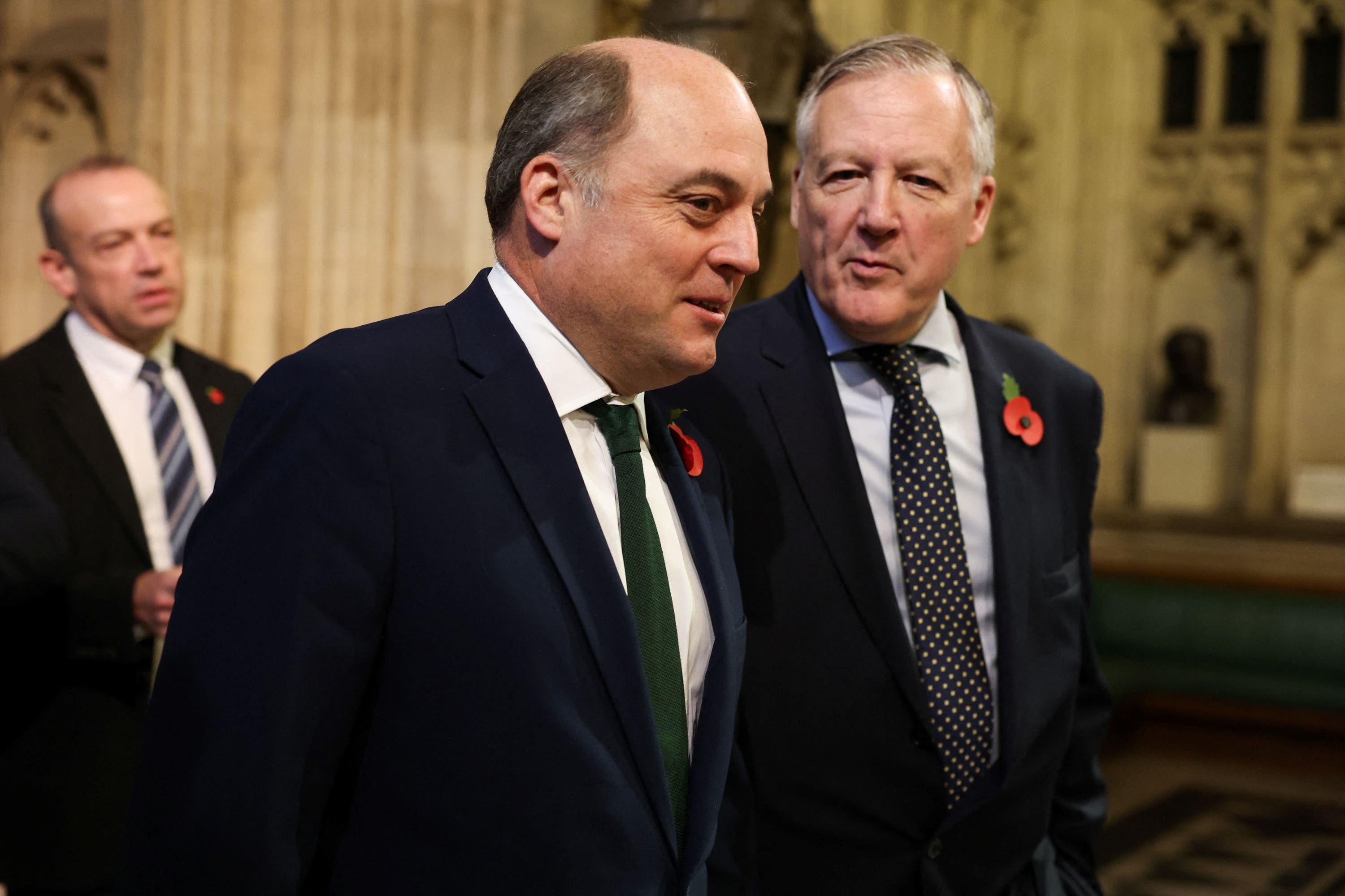Ben Wallace (centre) walks through the Members’ Lobby at the Palace of Westminster following the State Opening of Parliament in the House of Lords, London (PA)