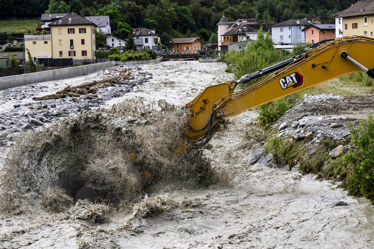 3 missing in a landslide in Swiss Alps as heavy rains cause flash floods