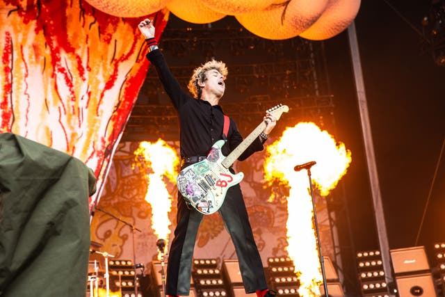 <p>Green Day frontman Billie Joe Armstrong, along with bassist and backing vocalist Mike Dirnt, and drummer Tre Cool, perform a sold-out show at Emirates Old Trafford on the opening night of The Saviors tour</p>