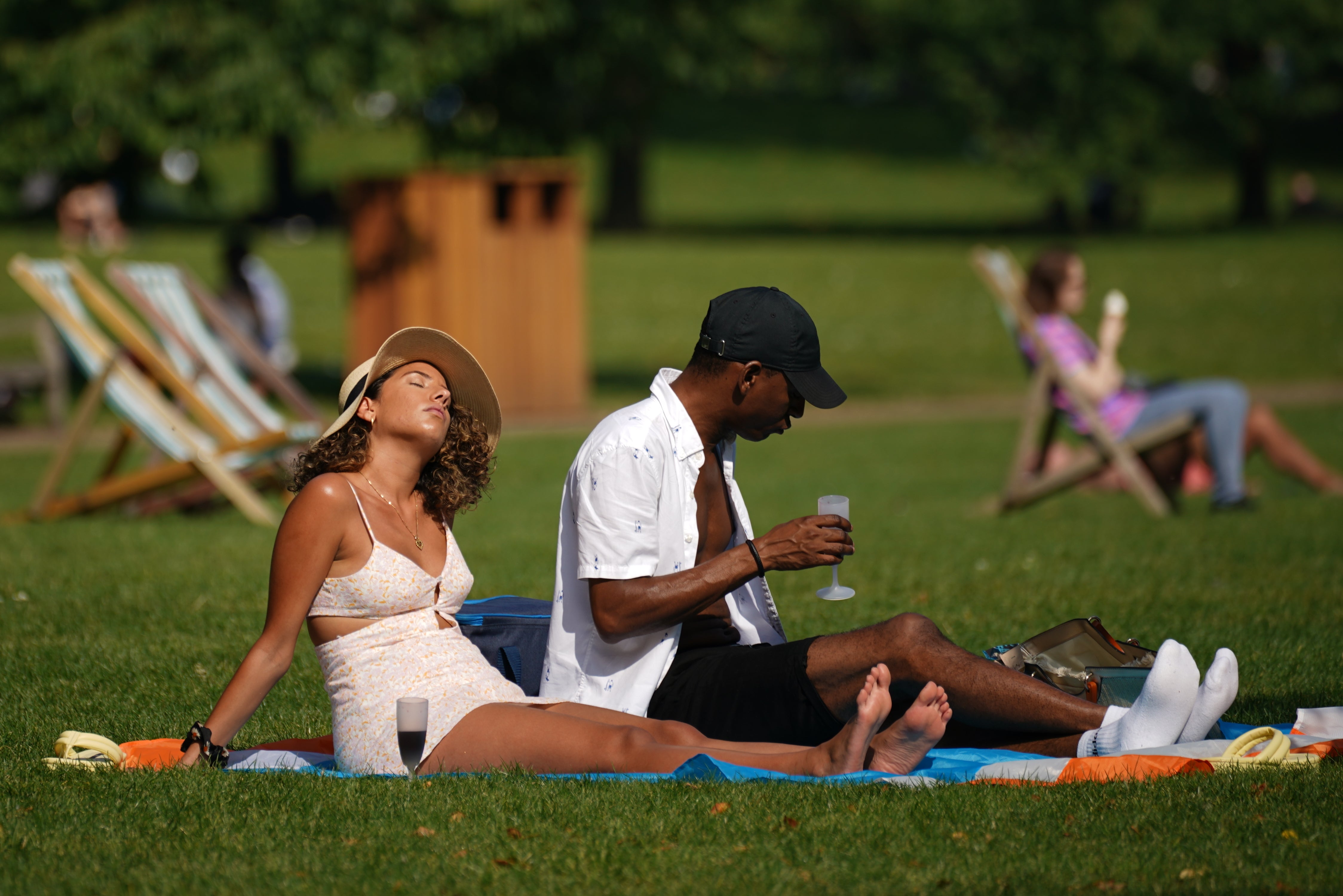 UK Heatwave People enjoy the sun in St James’s Park, London