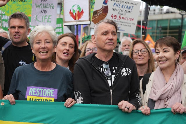 Dame Emma Thompson, Dale Vince and Caroline Lucas took part in a Restore Nature Now protest in central London (Jeff Moore/PA)