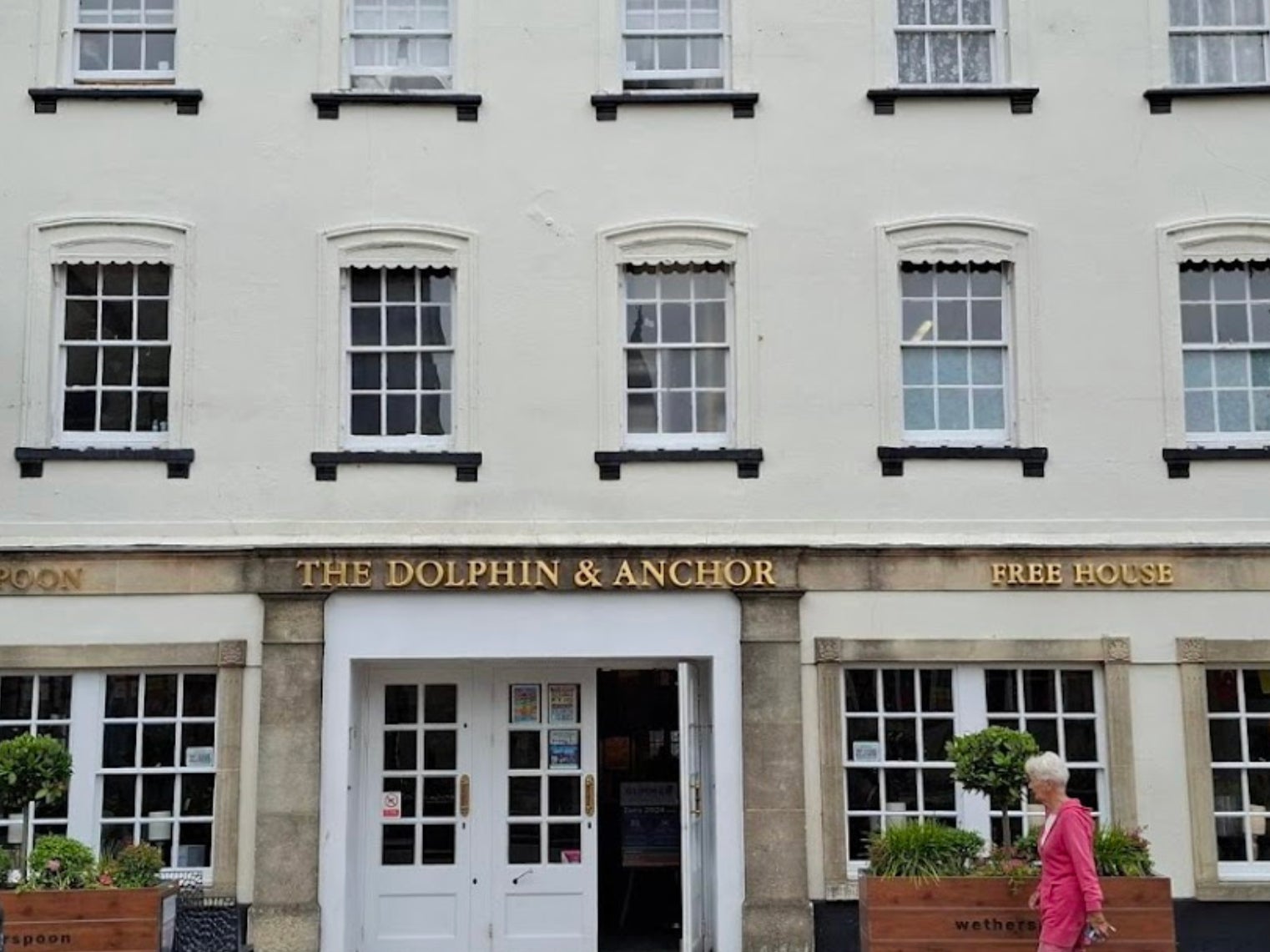 A Google Maps street view shows the front of The Dolphin and Anchor Wetherspoons in Chichester