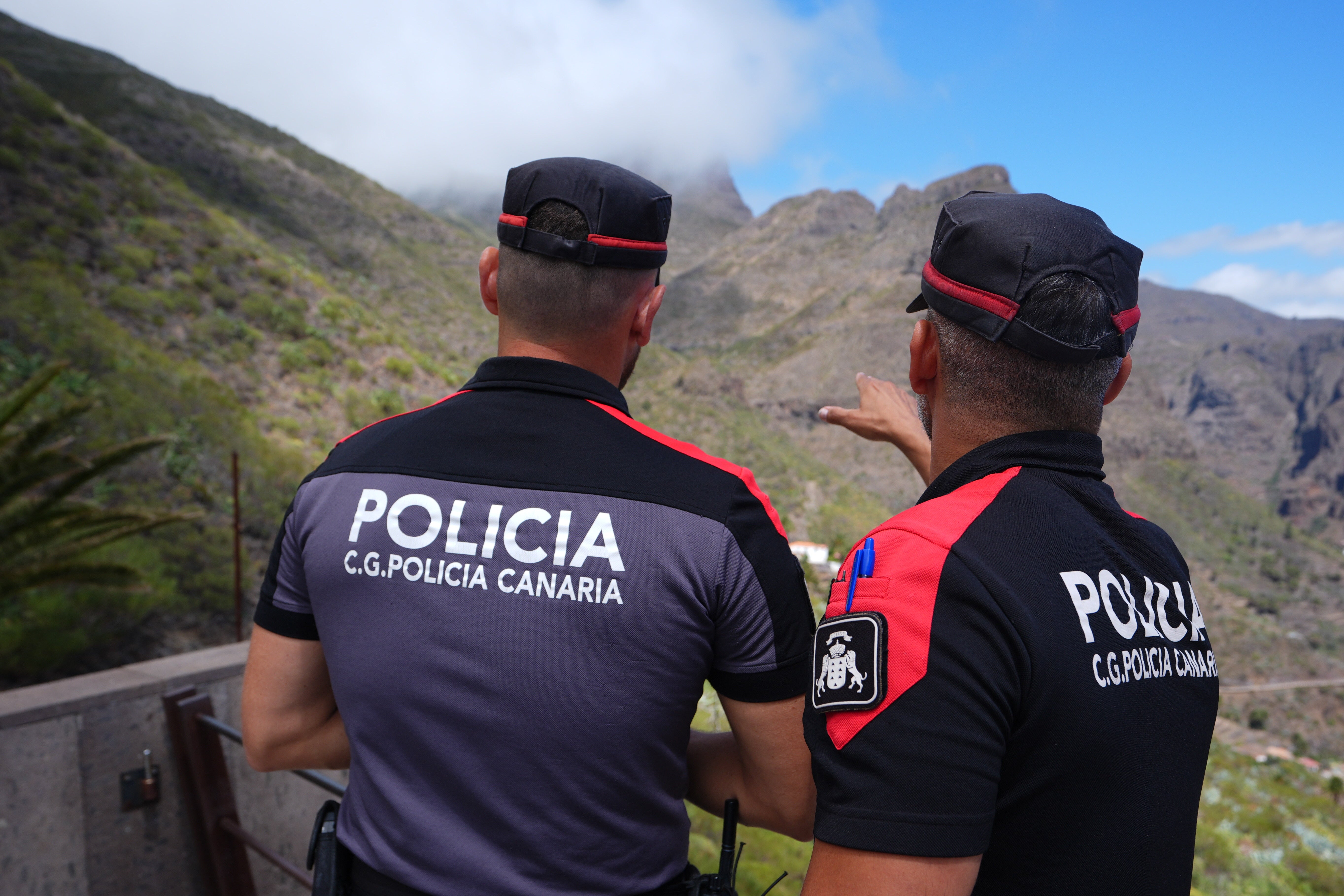 File photo: Police officers overlook the village of Masca, Tenerife, amid the search for missing British teenager Jay Slater