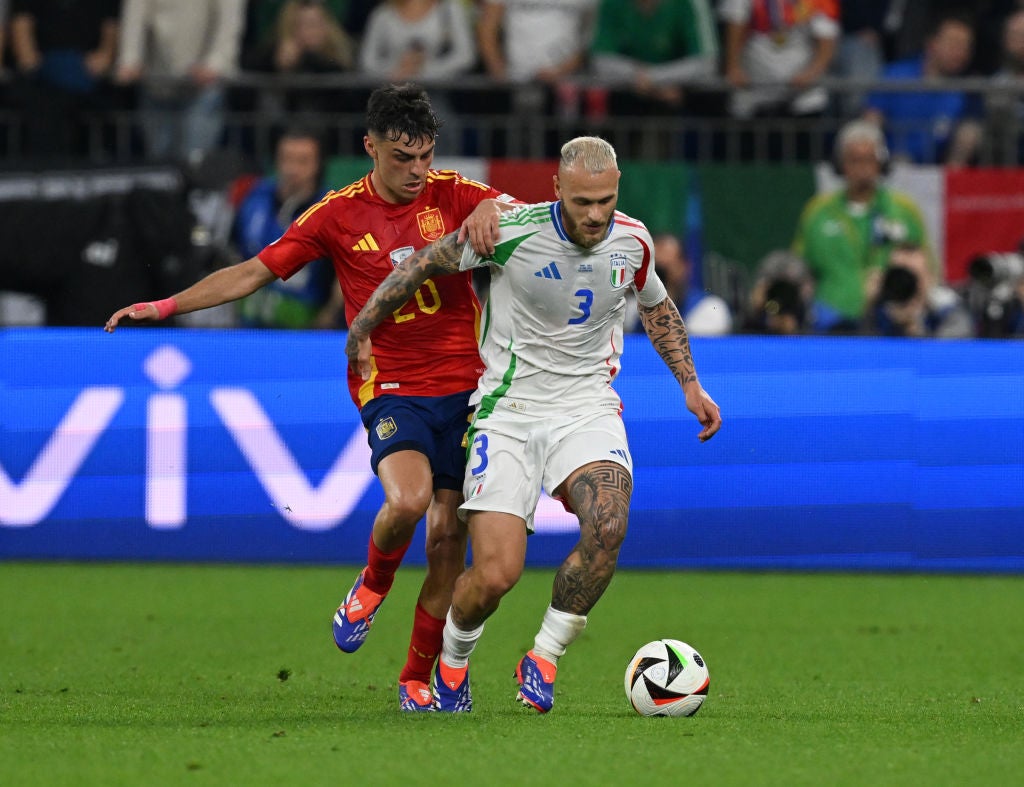 Pedri of Spain chases Italy’s Federico Dimarco during a dominant 1-0 win