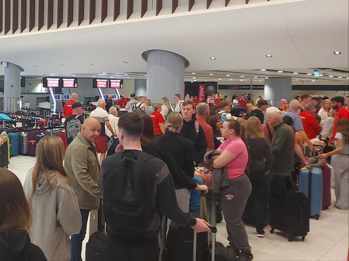 Passengers at Manchester Airport terminal 2 during the power cut