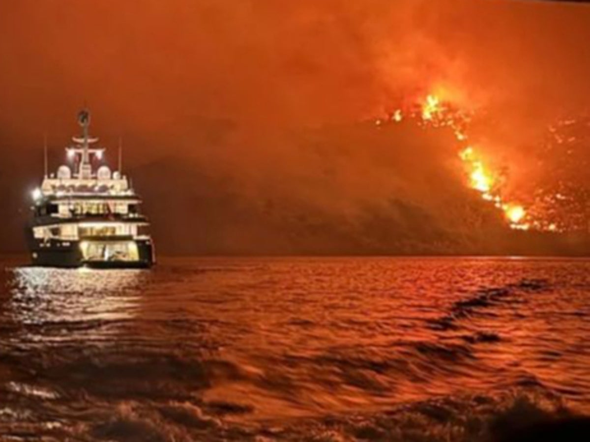 Fireworks launched from yacht ‘spark forest fire in Greece’ leading to 13 arrests