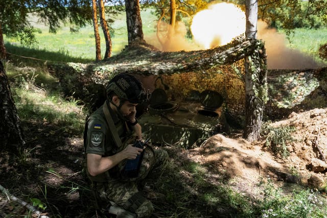 <p>A Ukrainian serviceman fires a self-propelled howitzer towards Russian troops in the Kharkiv region</p>