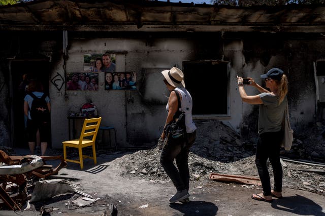 <p>A group of Israelis on an educational tour visit the home of the Siman Tov family on Friday, June 21, 2024</p>