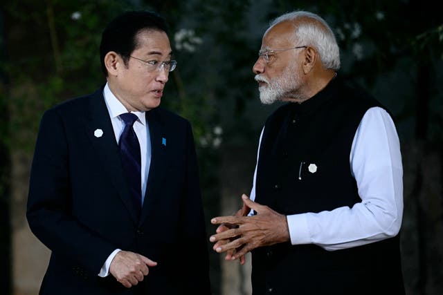 <p>Japanese Prime Minister Fumio Kishida (L) speaks with Indian Prime Minister Narendra Modi before a family photo of  the G7 heads of States and the heads of delegation of Outreach countries at Borgo Egnazia </p>
