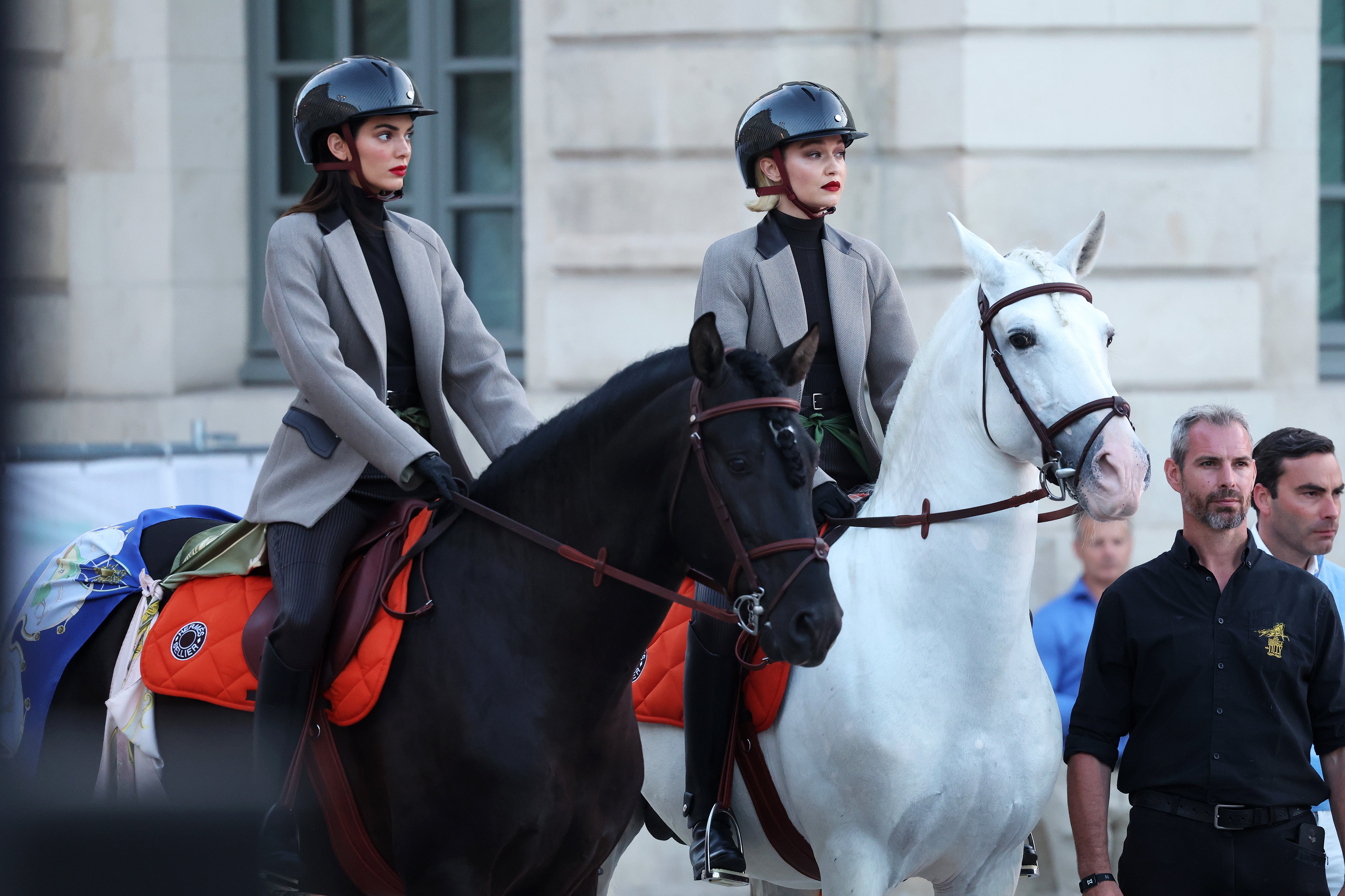 Kendall Jenner and Gigi Hadid ride horses on the runway during Vogue World: Paris