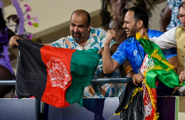 <p>Supporters of Afghanistan cheer their team against Australia</p>