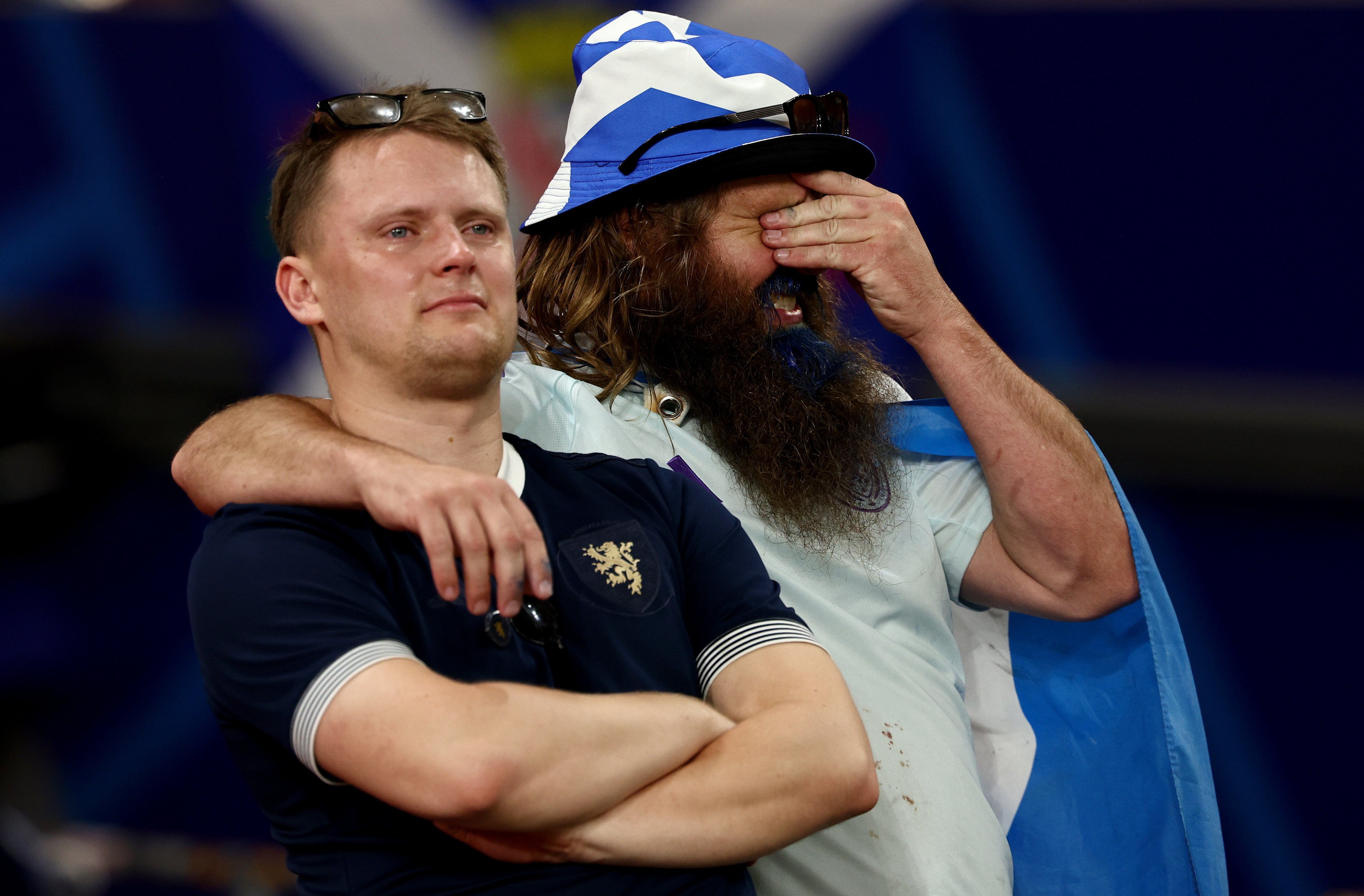 Dejected Scotland fans after their Euro 2024 exit