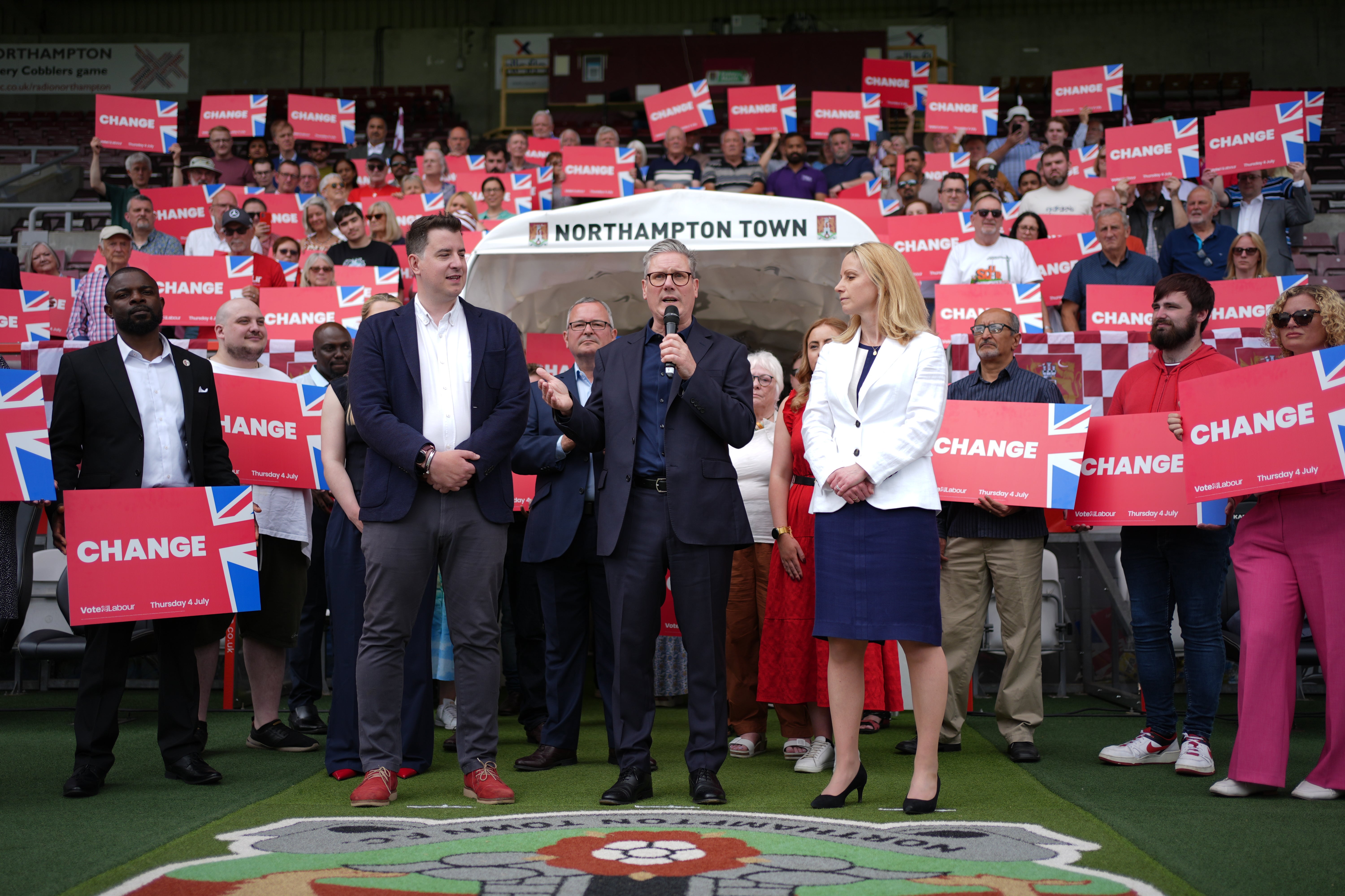 Labour Party leader Sir Keir Starmer (centre) speaking during a visit to Northampton Town Football Club at Sixfields Stadium in Northampton, while on the General Election campaign trail