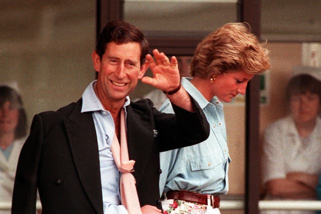 The Prince and Princess of Wales leaving Cirencester Hospital after Charles broke his arm in 1990 (David Jones/PA)