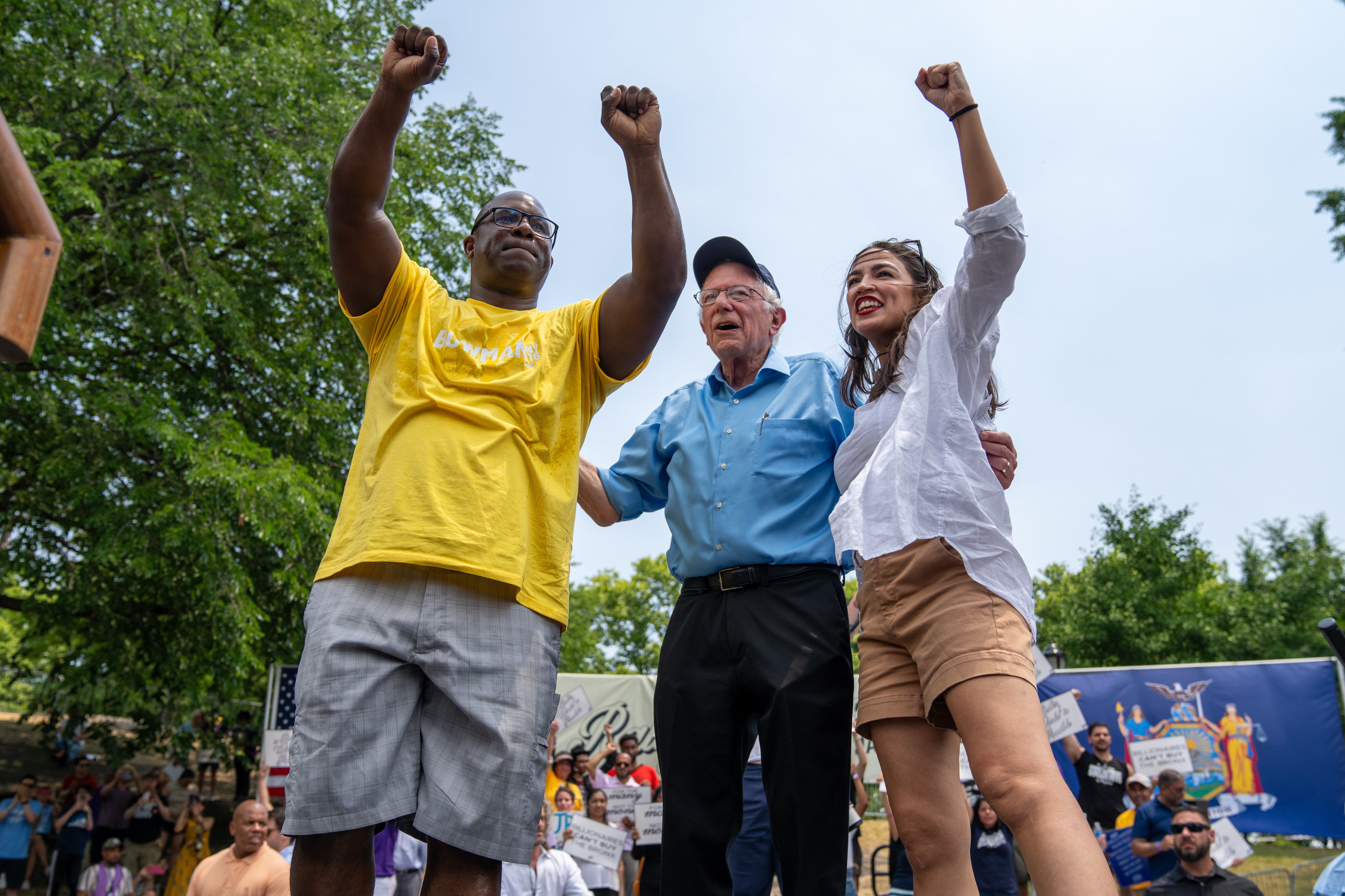 U.S. Rep. Jamaal Bowman (D-NY), U.S. Sen. Bernie Sanders (I-VT), and Rep. Alexandria Ocasio-Cortez (D-NY) attend a rally at St. Mary’s Park on June 22, 2024 in the Bronx borough of New York City. Supporters gathered three days before New York’s primary elections as incumbent Rep. Jamaal Bowman (D-NY) attempts to retain his seat in a heated primary race.