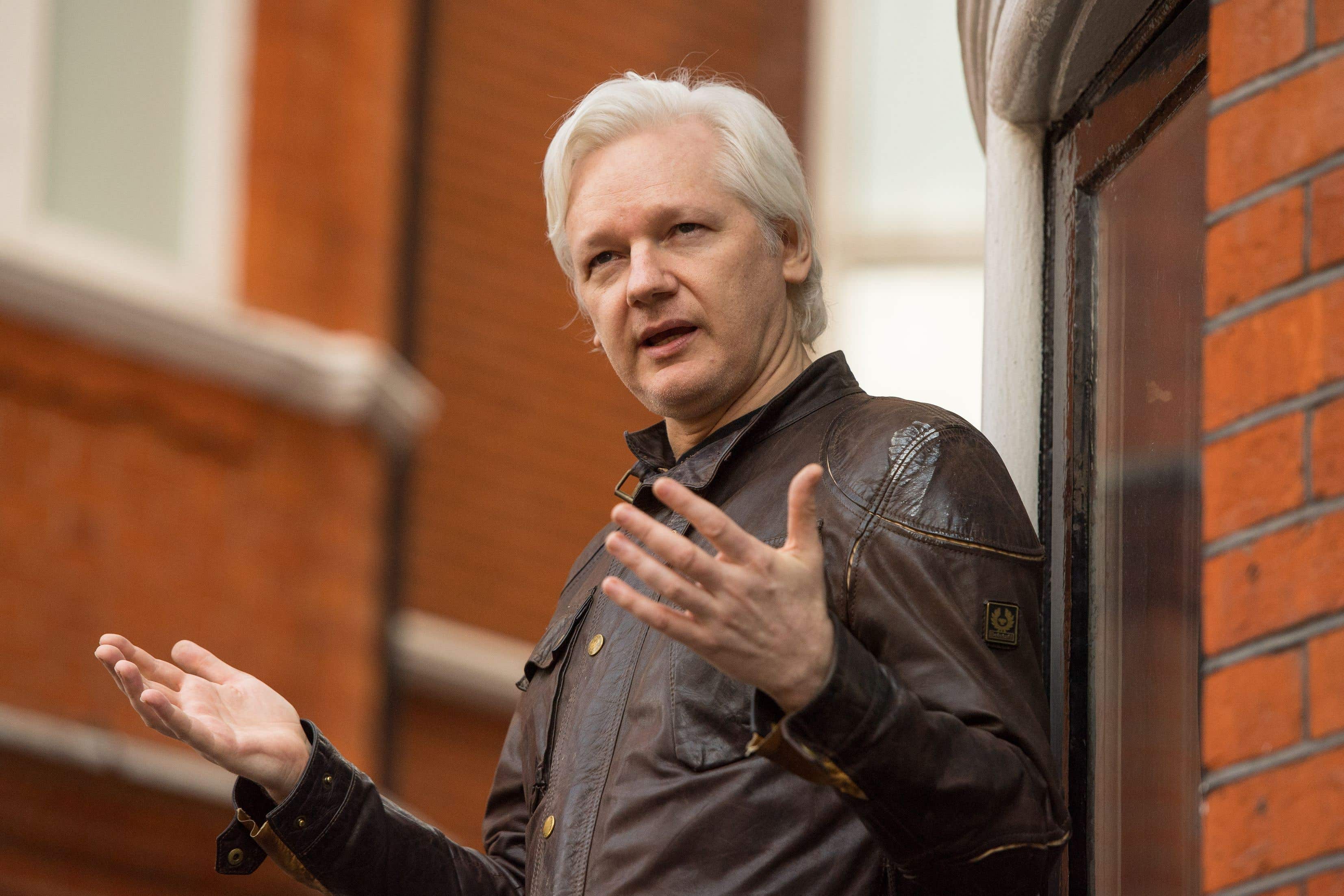 Julian Assange has been freed from Belmarsh Prison and has left the UK, WikiLeaks said (PA)